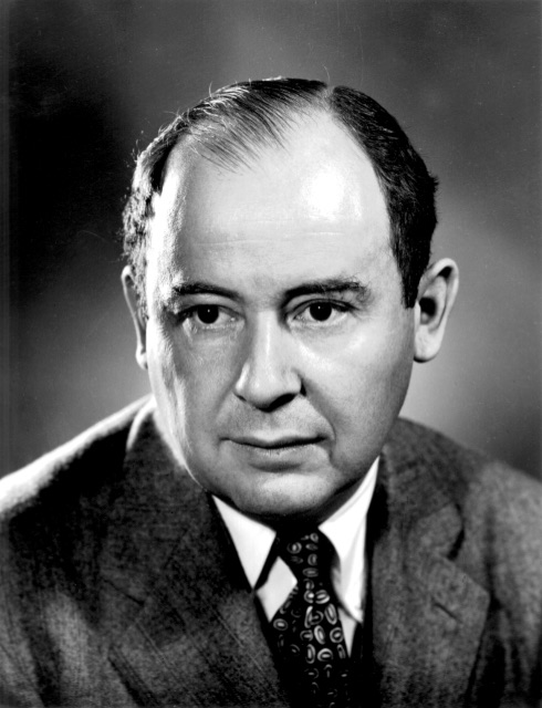 Black and white ID-style portrait of John von Neumann in a suit and tie