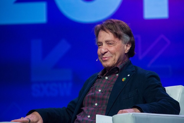 Ray Kurzweil speaking on stage at SXSW in 2017